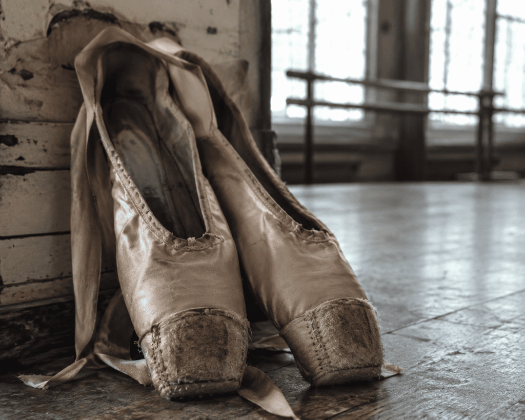 Early pointe shoes from the 19th century made from reinforced satin slippers